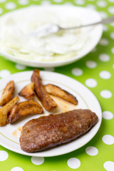 Stuffed burger with potatoes