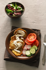 Zucchini fritters with salad
