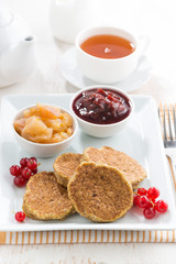 breakfast with homemade pancakes and jams, vertical