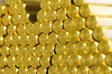 Close up on brass rods in stack
