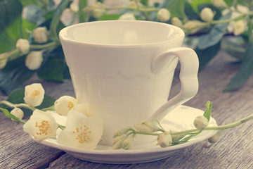 Wild flowers and cup