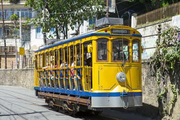 Plakat Iconic bonde tram travels along the streets of the tourist nieghborhood of Santa Teresa in Rio de Janeiro, Brazil 