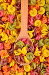 Fototapeta na wymiar Colored italian pasta in a spoon