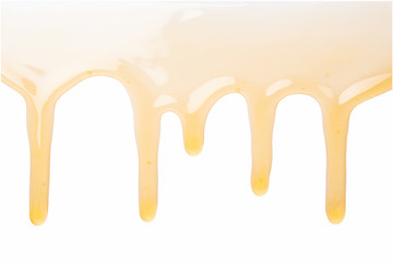 honey drops on white