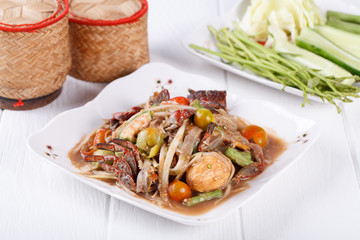 Somtum, papaya salad with pickled fish delicious food in thailan