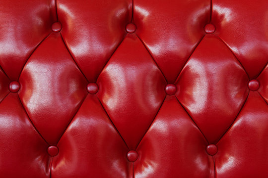 Background of a red leather armchair
