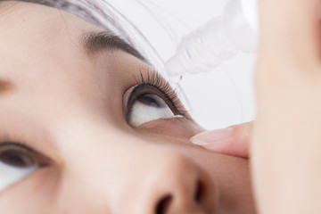 Obraz na płótnie Canvas Close up drips into eye cataract medication.