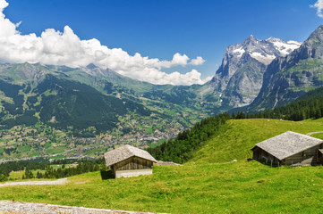 Fototapeta na wymiar Beautiful idyllic mountains landscape with country house (chalet) in summer, Alps, Switzerland 