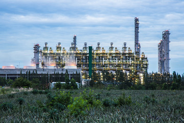 View of oil and gas refinery industry plant at twilight time