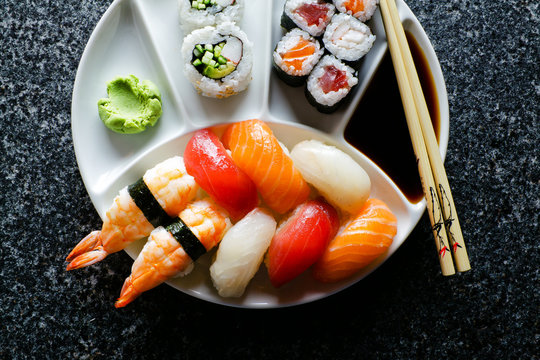 sushi Plate with Sushi Set nigiri and sushi rolls , maki, soy sa