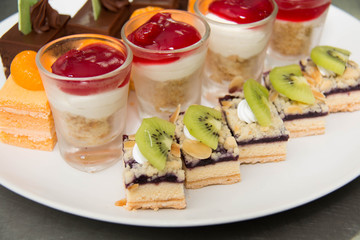 Plate of pastries with various delicious desserts
