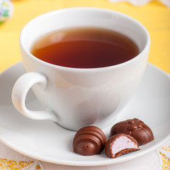 A Cup of Tea with Easter Egg Shaped Chocolate Candies