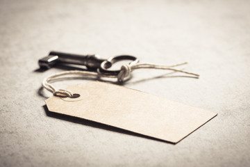Blank key tag. Concept of a new home, vintage lifestyle and nostalgia.