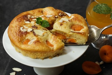 Apricot cake / Apricot pudding cake with fresh apricots, selective focus