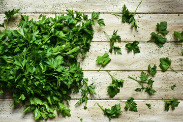 buncho of parsley on a rustic white table