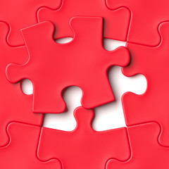 Obraz premium red jigsaw puzzle pieces with one piece laying on top (3d illustration)