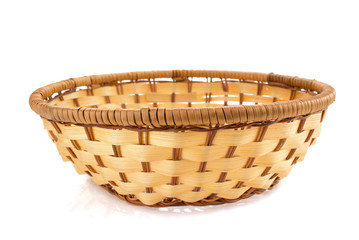 wicker plate on white background