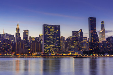 Fototapeta na wymiar New York City manhattan buildings night skyline