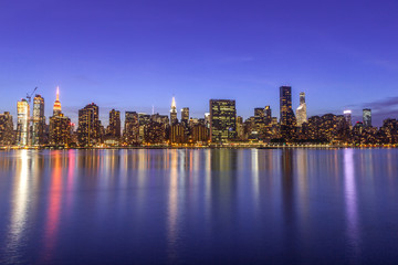 Fototapeta na wymiar New York City manhattan buildings night skyline