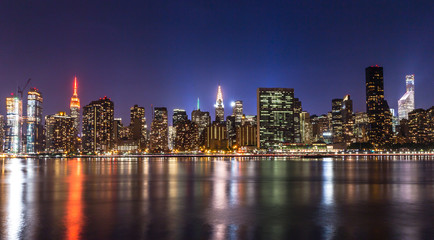Fototapeta premium New York City manhattan buildings night skyline