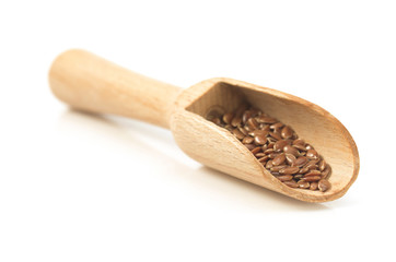 flax seeds in scoop on white