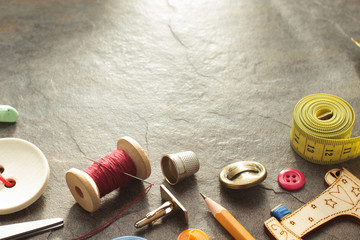 sewing tools and accessories on table