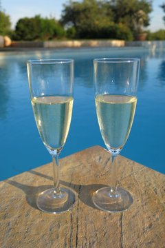 champagne by swimming pool