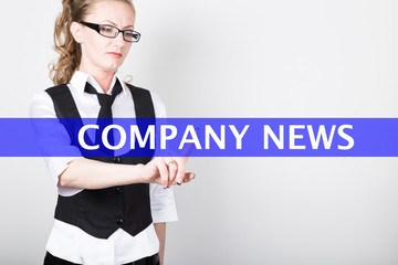 company news written on a virtual screen. Internet technologies in business and tourism. woman in business suit and tie, presses a finger on a virtual screen