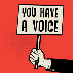 Poster in hand, business concept with text You Have a Voice
