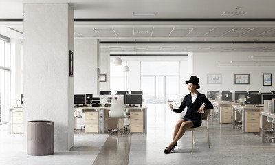 Fototapeta na wymiar Businesswoman on chair in office