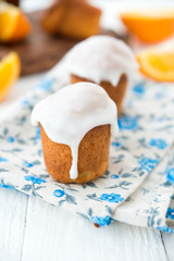 Fresh orange muffins with sugar fondant
