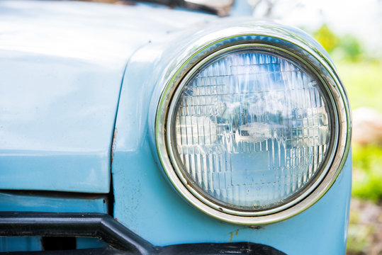 Old Car With Close-up On Headlights