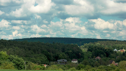Clouds over the houses in the valley