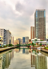 Fototapeta na wymiar Buildings and canal in Minato ward - Tokyo