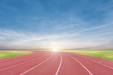 Athlete track or running track with sky sunset background