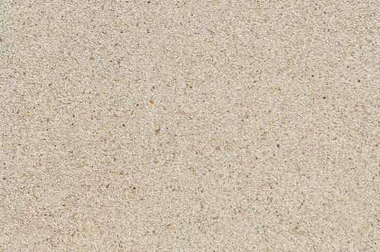 Square pixel mosaic background with light brownish tones