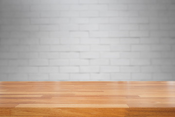 Empty table and white brick wall background
