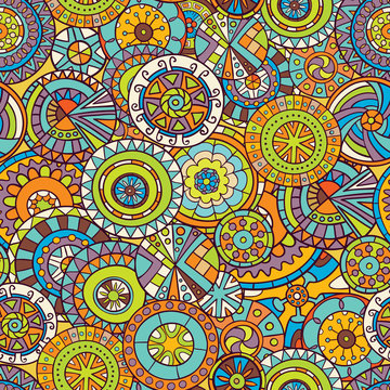 Seamless pattern of hand-drawn and painted mandalas. Vector graphics.