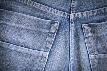 Denim texture. Denim background. Denim jeans. Denim fabric. Denim Surface. Blue jeans. Jeans texture. Jeans background. Jeans fabric. Jeans textile. jeans Surface. Jeans detail. Dark edged.