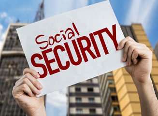 Social Security placard with urban background