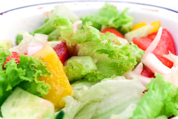 Fresh mixed vegetables salad. Selective focus