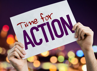 Time for Action placard with night lights on background