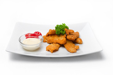 Nuggets with sauce on a plate
