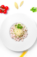 Spaghetti carbonara on a white background