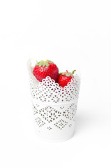 Strawberry bucket on a white background