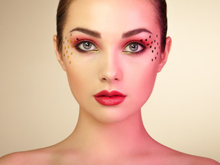 Fototapeta premium Beautiful woman face. Perfect makeup. Beauty fashion. Eyelashes. Lips. Cosmetic Eyeshadow. Perfect skin