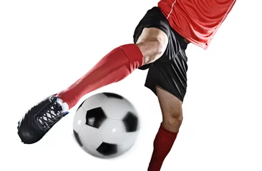 Foto op Plexiglas close up legs and soccer shoe of football player in action kicking ball isolated on white background © Wordley Calvo Stock