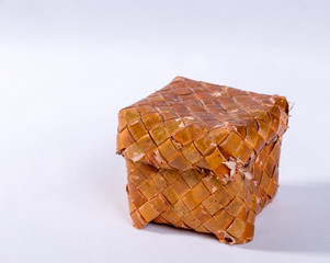 Little rusty wicker container