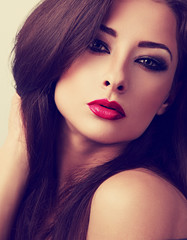 Fototapeta premium Beautiful evening makeup woman with red lipstick looking sexy. C