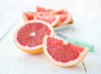 Fototapeta na wymiar Slices of fresh red grapefruit 